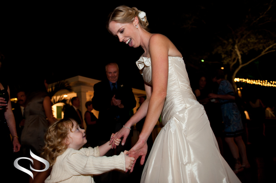 Bride Dancing with flower girl at Wedding Reception