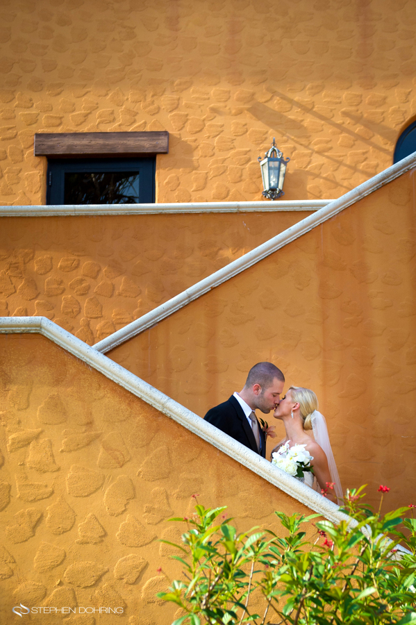 Creative bride and groom photo on stairs in Ft Myers wedding