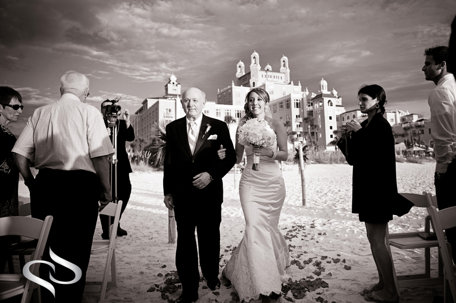 Bride walking down isle on beach at the Don Cesar