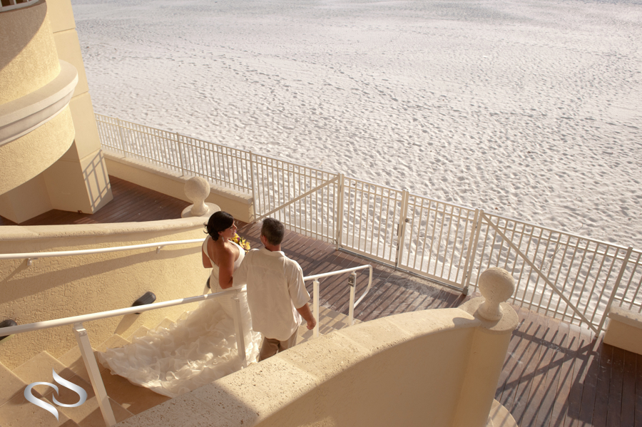 Bride and Groom walking on Clearwater Beach