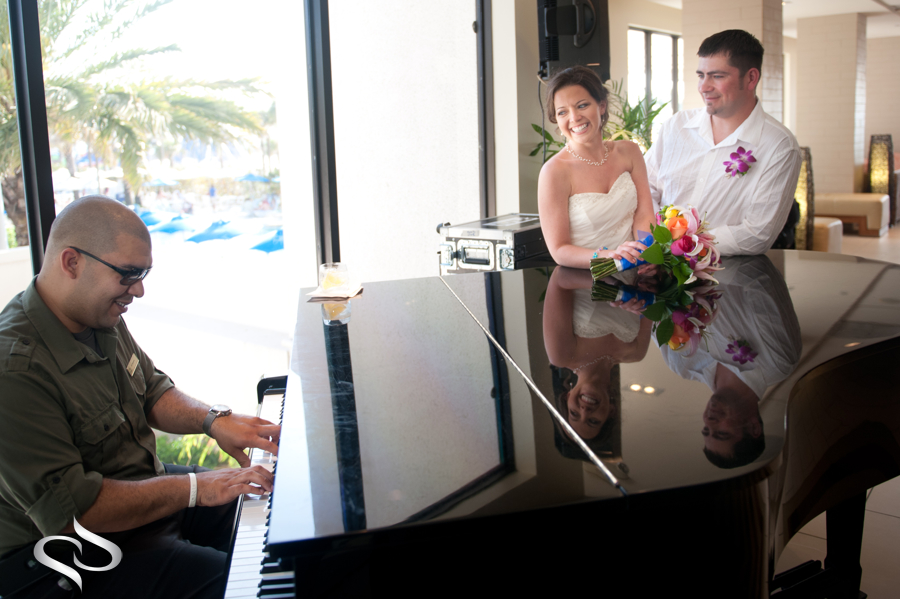 Bride and Groom with piano player Clearwater Beach Hilton