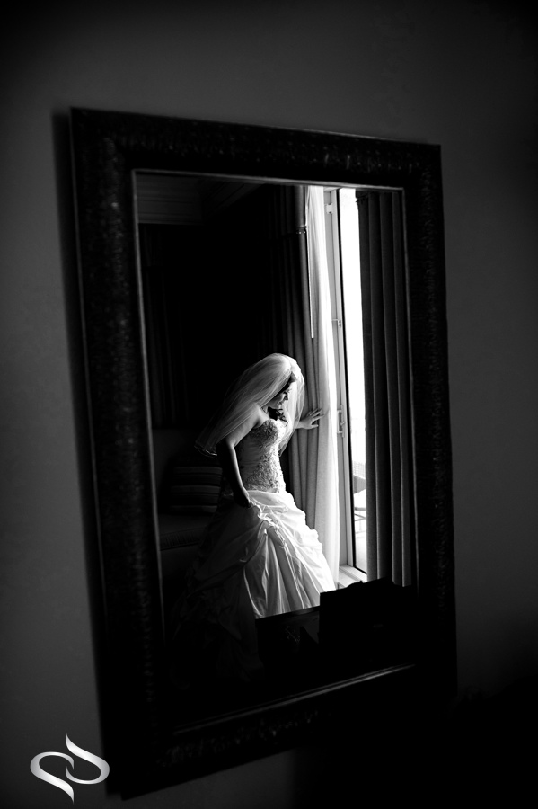 Bride in mirror at the Sandpearl resort wedding